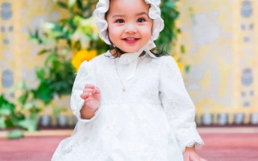 The Significance of a Christening Dress tag image